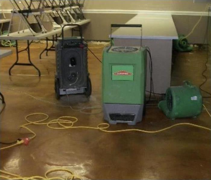 Drying equipment placed in area that has been damaged by water